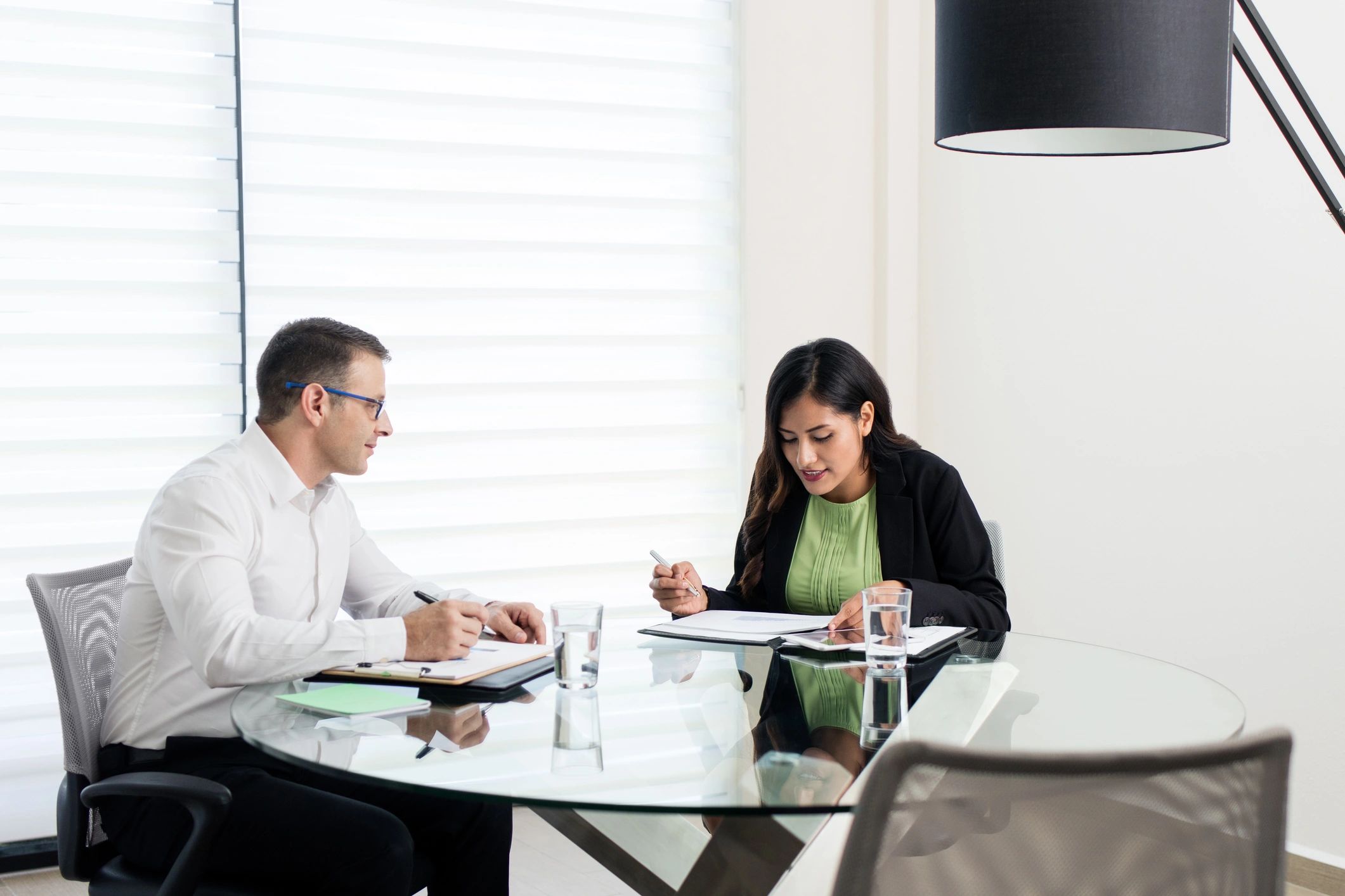 Attorney reviewing documents with a client