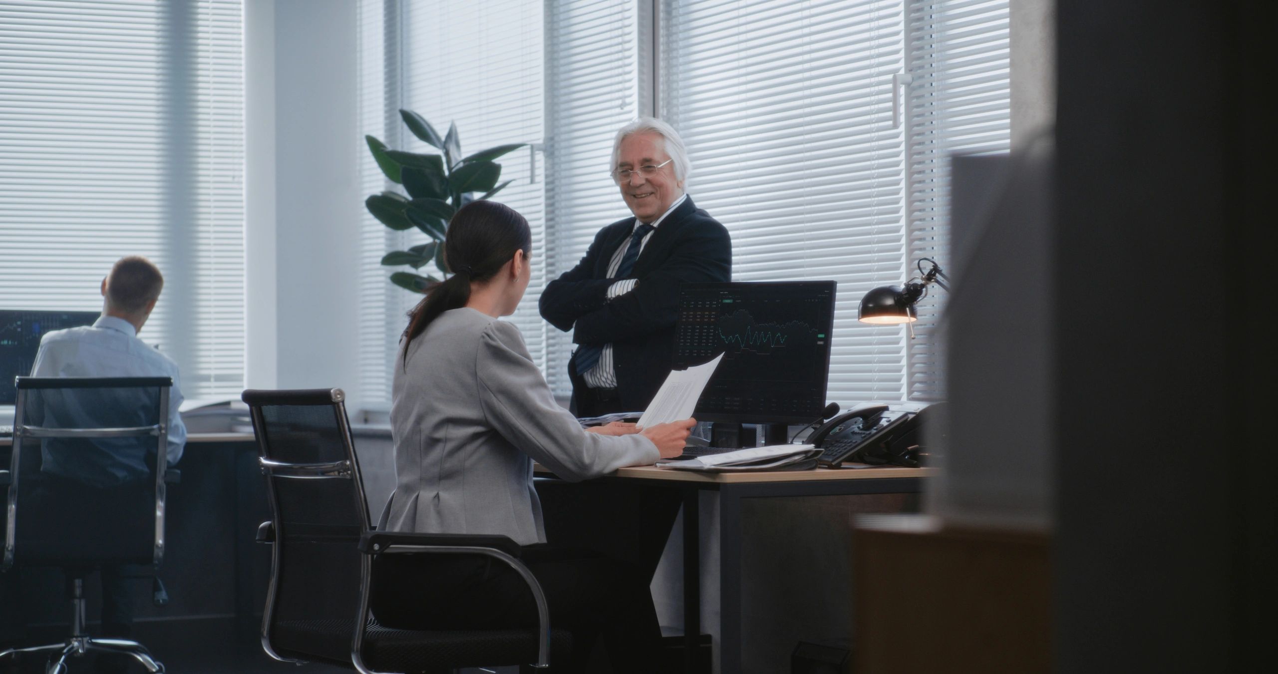 Attorney and client meeting in a professional office